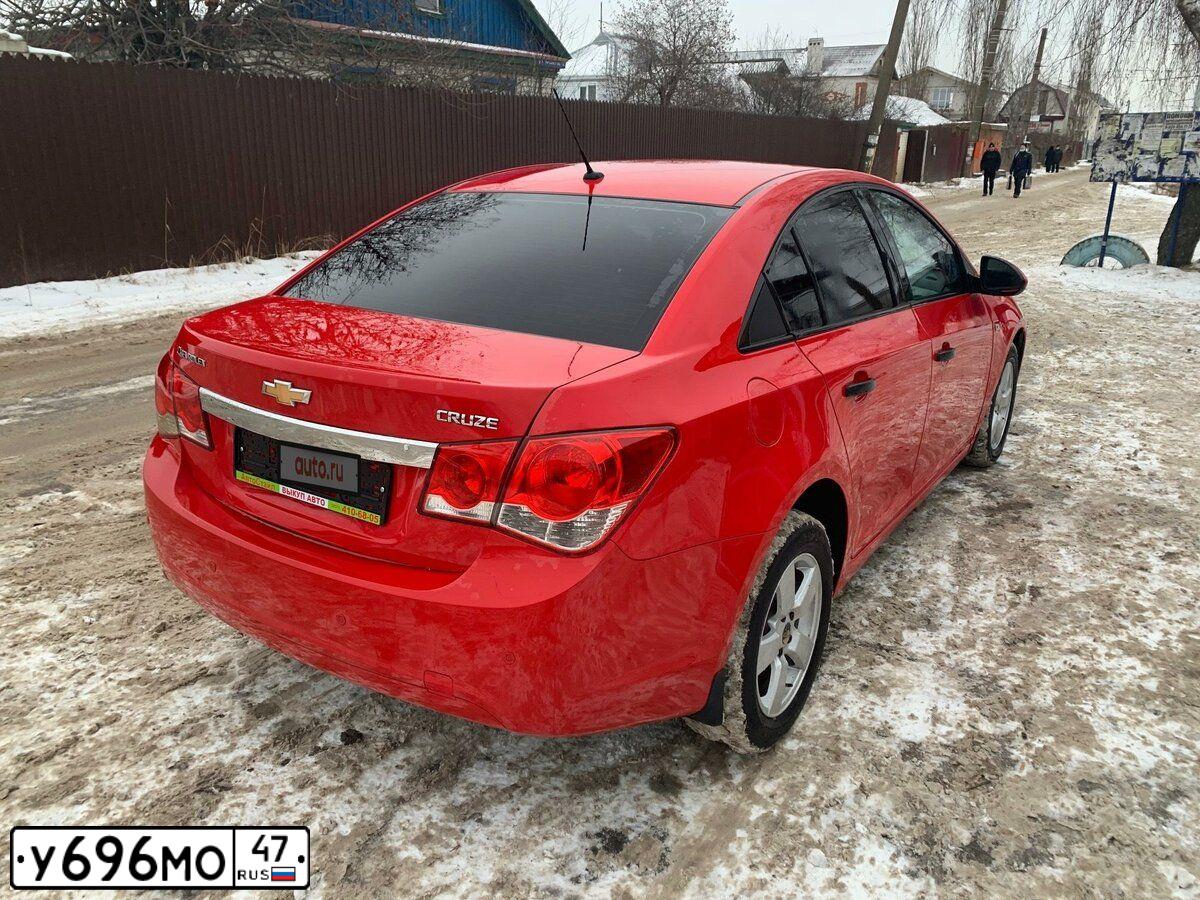 Фото автомобиля CHEVROLET CRUZE, 2011 — госномер Т704КТ152. Цвет: КРАСНЫЙ МЕТАЛЛИК