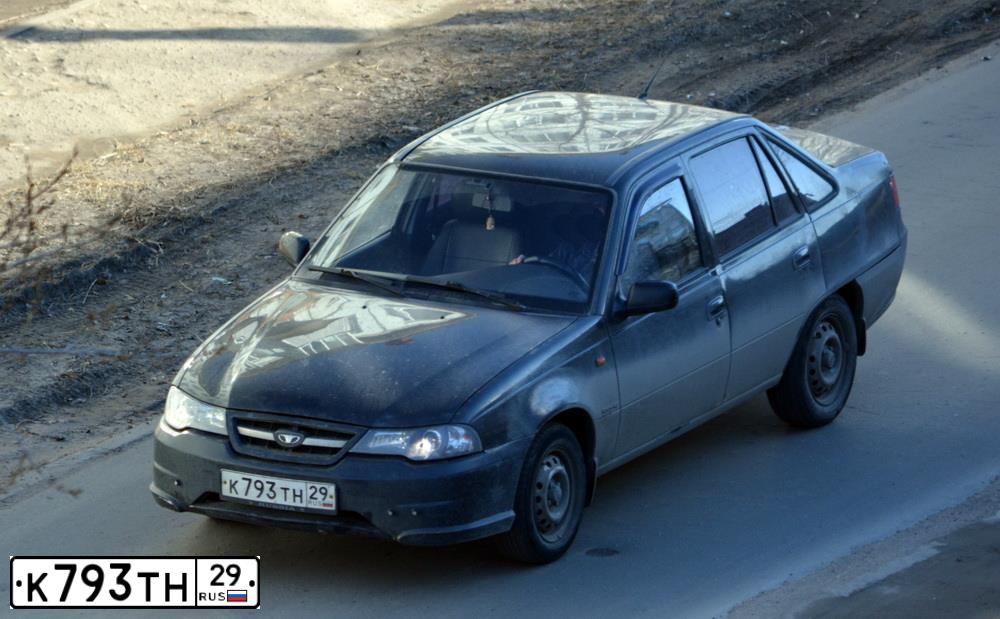Фото автомобиля DAEWOO NEXIA, 2010 — госномер К793ТН29. Цвет: БЛЕДНО-ЧЕРНЫЙ