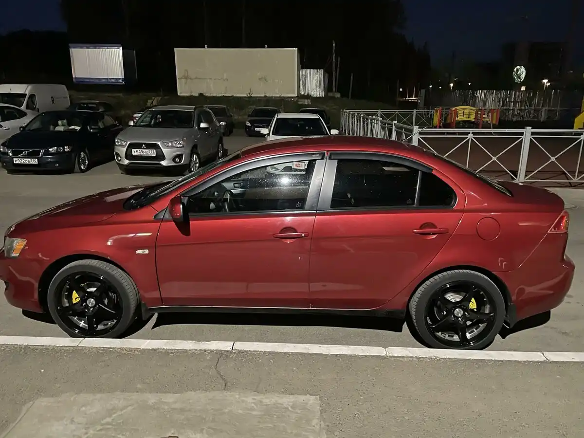 Фото автомобиля VOLVO C30, 2007 — госномер Е254ТО177. Цвет: Темно-синий