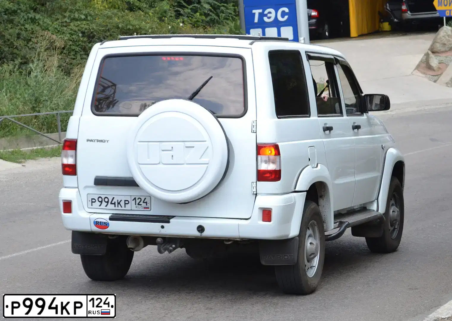 Фото автомобиля UAZ 3163 PATRIOT, 2012 — госномер Р994КР124. Цвет: Белый