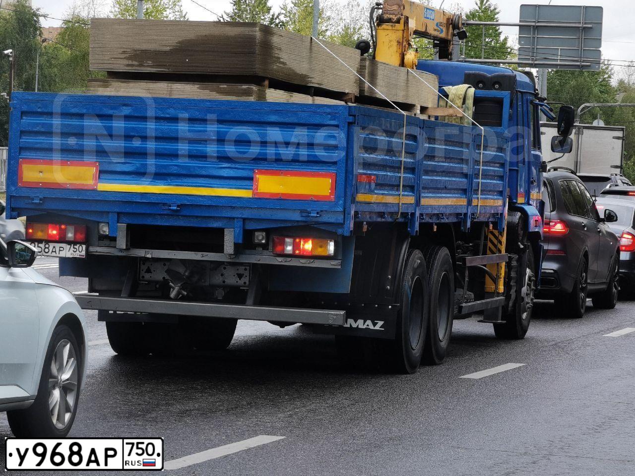 Фото автомобиля VOLVO O SERIE FM 6X4, 2007 — госномер В322АР102. Цвет: Красный