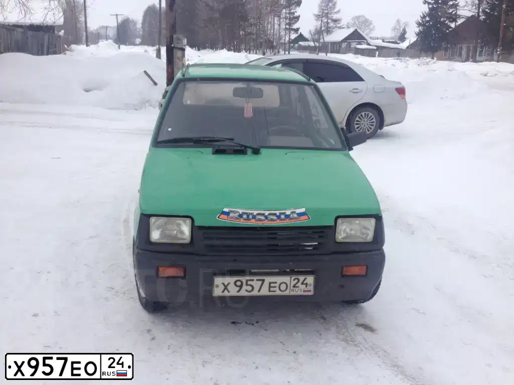 Фото автомобиля VAZ ВАЗ11113, 2000 — госномер Х957ЕО24. Цвет: ЗЕЛЕНЫЙ