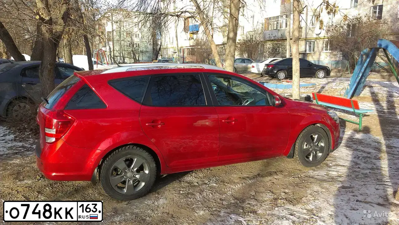 Фото автомобиля KIA CEE'D, 2010 — госномер Н760РЕ21. Цвет: Красный