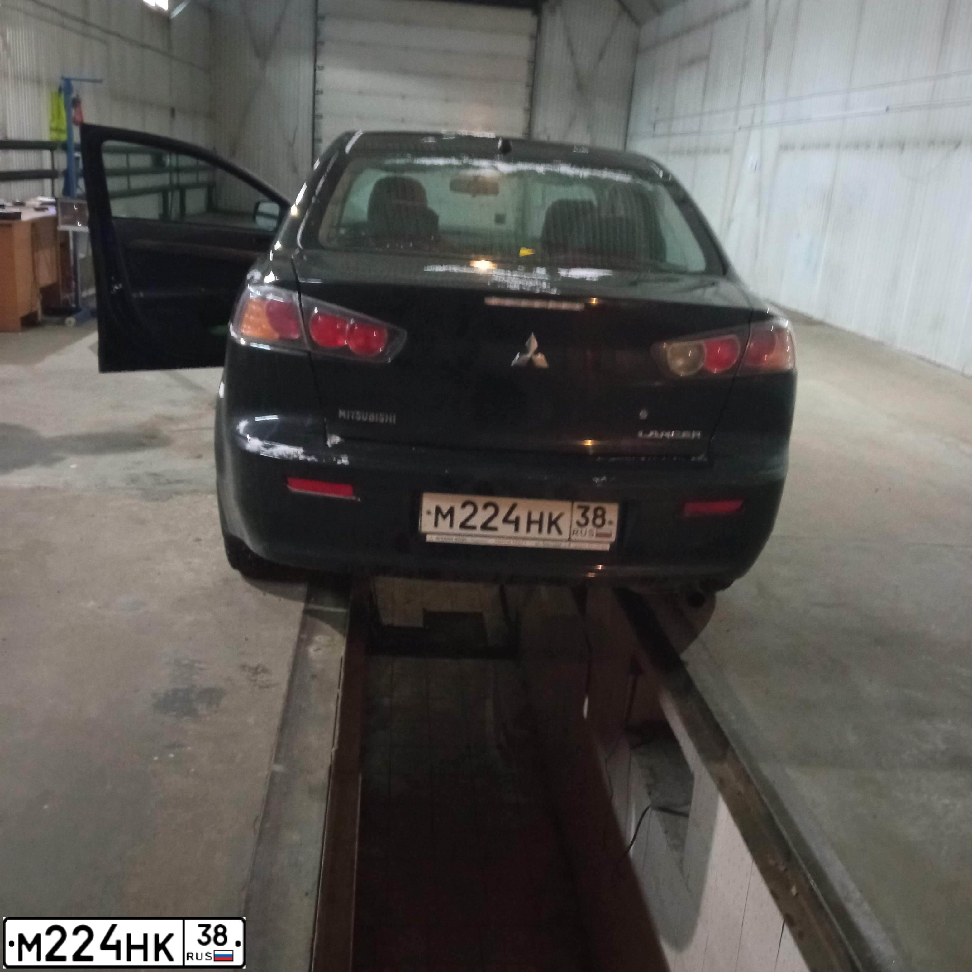 Фото автомобиля MITSUBISHI LANCER, 2012 — госномер Н726МТ123. Цвет: ЧЕРНЫЙ