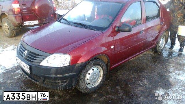 Фото автомобиля RENAULT LOGAN, 2011 — госномер А335ВН76. Цвет: Черно-красно-серый
