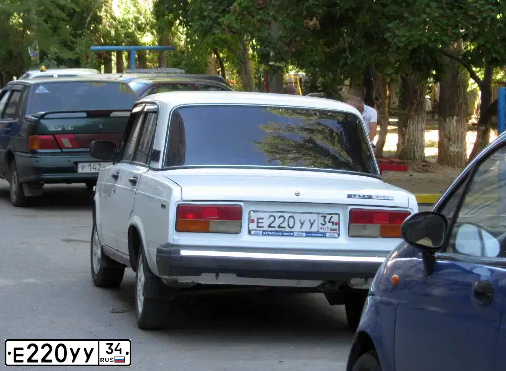 Фото автомобиля LADA 2107, 1997 — госномер А003КО13. Цвет: БАКЛАЖАННЫЙ