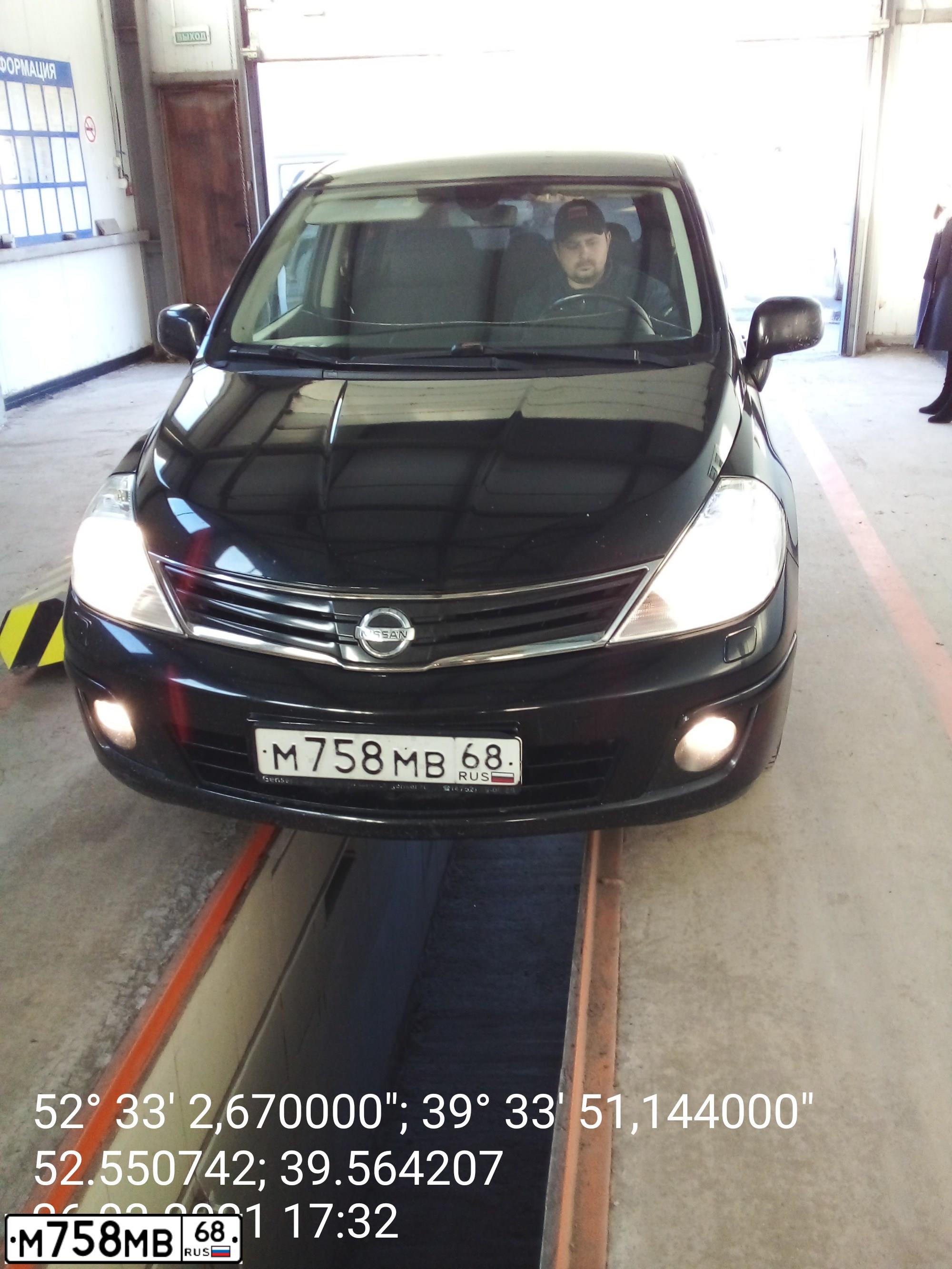 Фото автомобиля NISSAN TIIDA, 2010 — госномер Р691АВ48. Цвет: ЧЕРНЫЙ