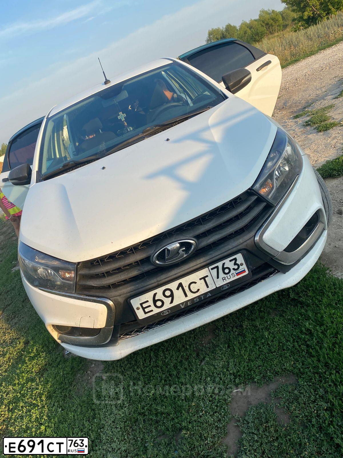 Фото автомобиля LADA VESTA, 2018 — госномер Х097СМ763. Цвет: Белый