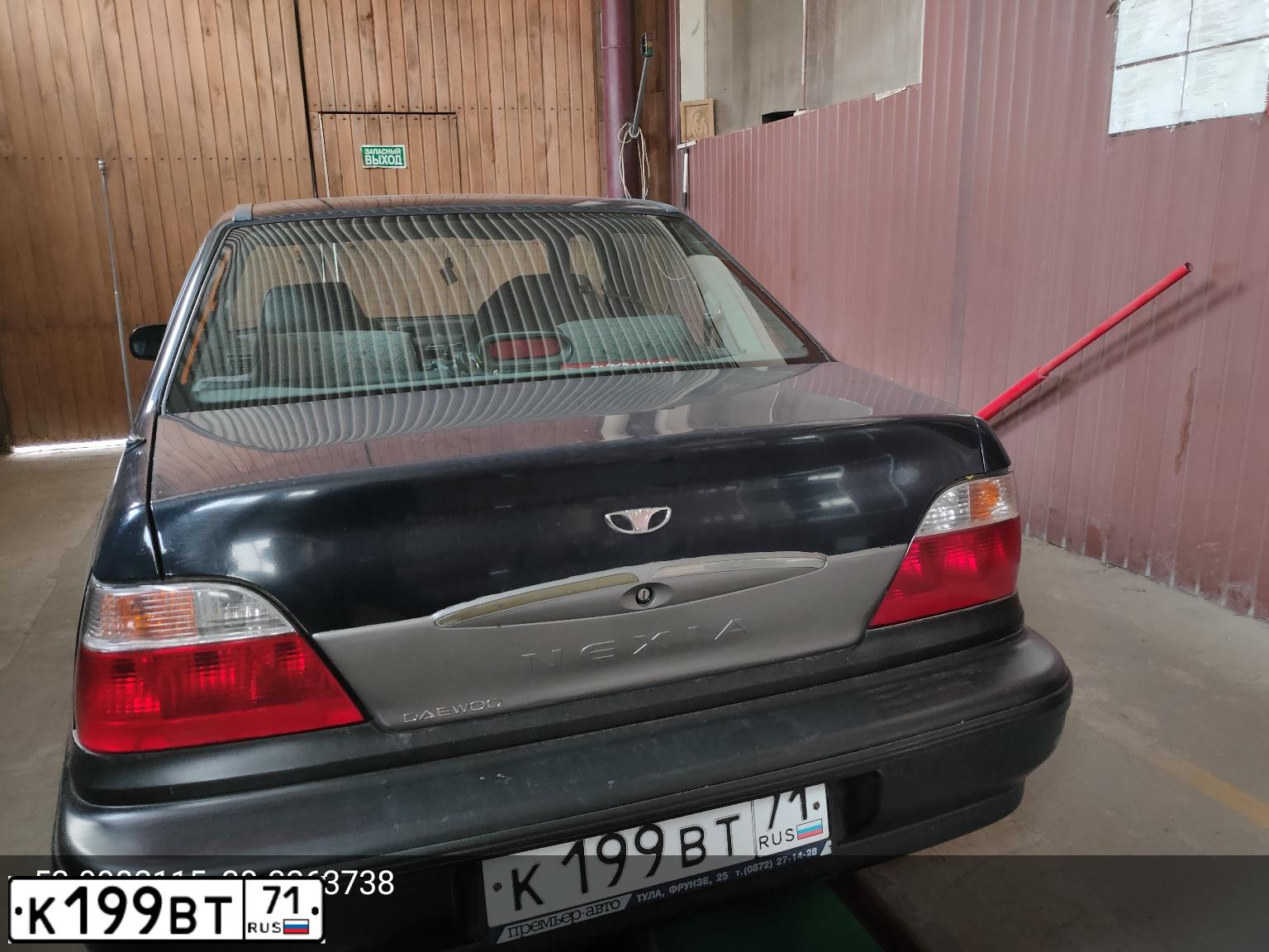 Фото автомобиля DAEWOO NEXIA, 2005 — госномер К199ВТ71. Цвет: СИНИЙ (ТЕМНО-СИНИЙ)