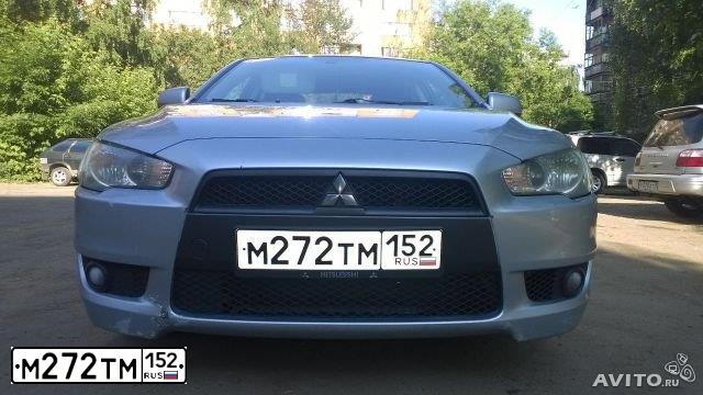 Фото автомобиля MITSUBISHI LANCER, 2008 — госномер М272ТМ152. Цвет: СВЕТЛО-СЕРЫЙ