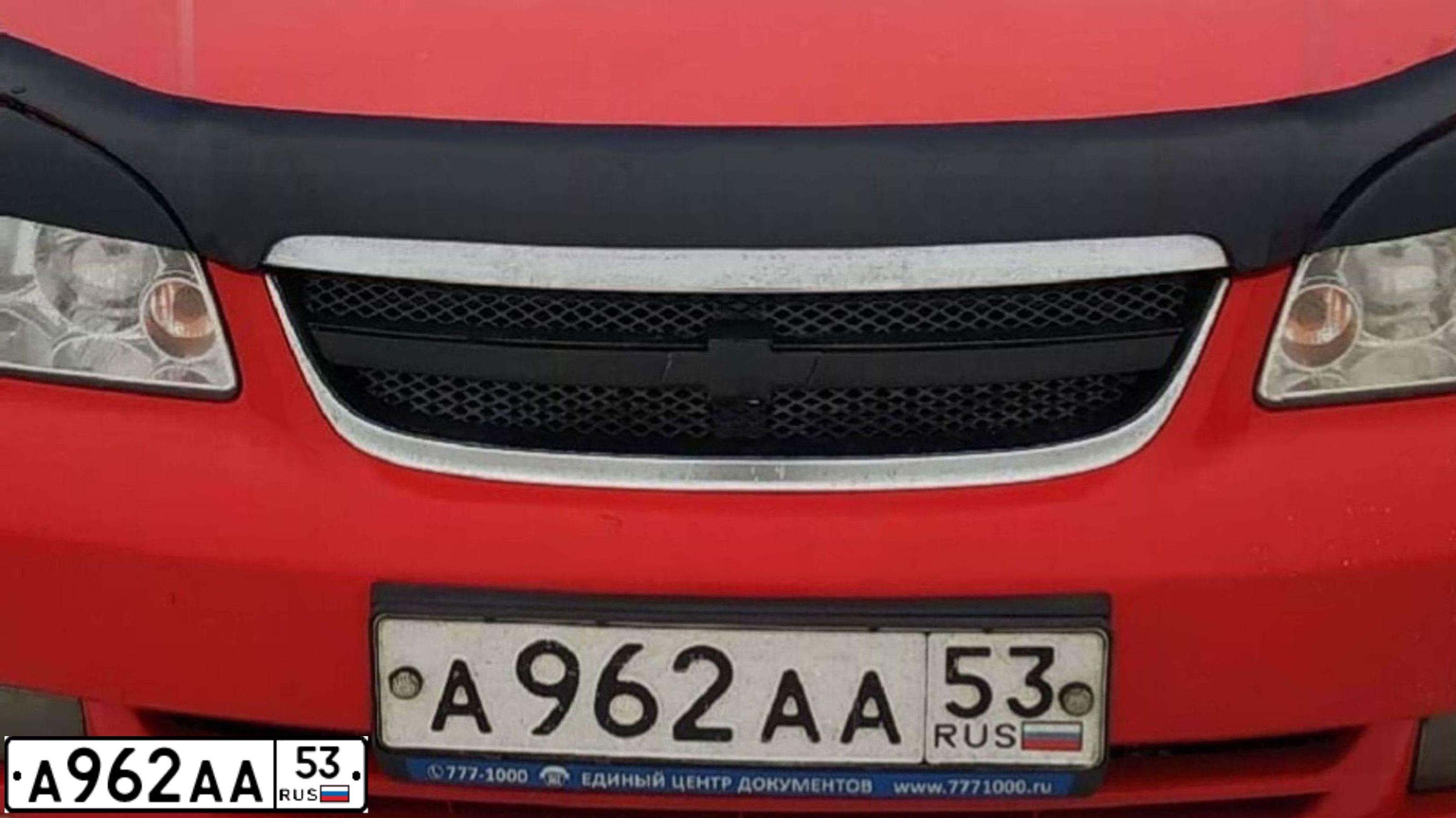 Фото автомобиля VOLKSWAGEN PASSAT, 1991 — госномер А962АА53. Цвет: Красный