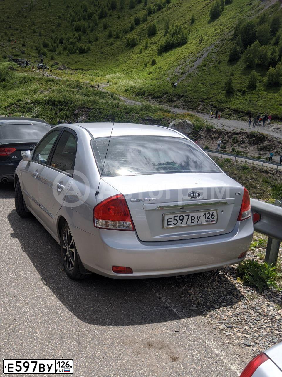 Фото автомобиля KIA CERATO, 2006 — госномер У665ЕЕ01. Цвет: серебристый