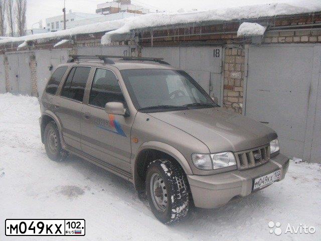 Фото автомобиля KIA SPORTAGE, 2004 — госномер С922ЕР102. Цвет: КОРИЧНЕВЫЙ