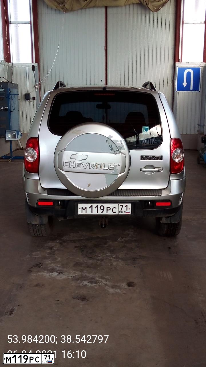 Фото автомобиля CHEVROLET NIVA, 2012 — госномер Е074ВУ57. Цвет: Светло-Серебристый металлик