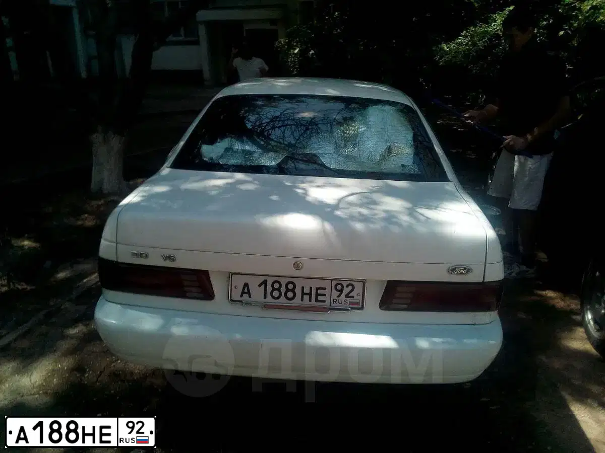 Фото автомобиля FORD TAURUS, 1990 — госномер М442АО82