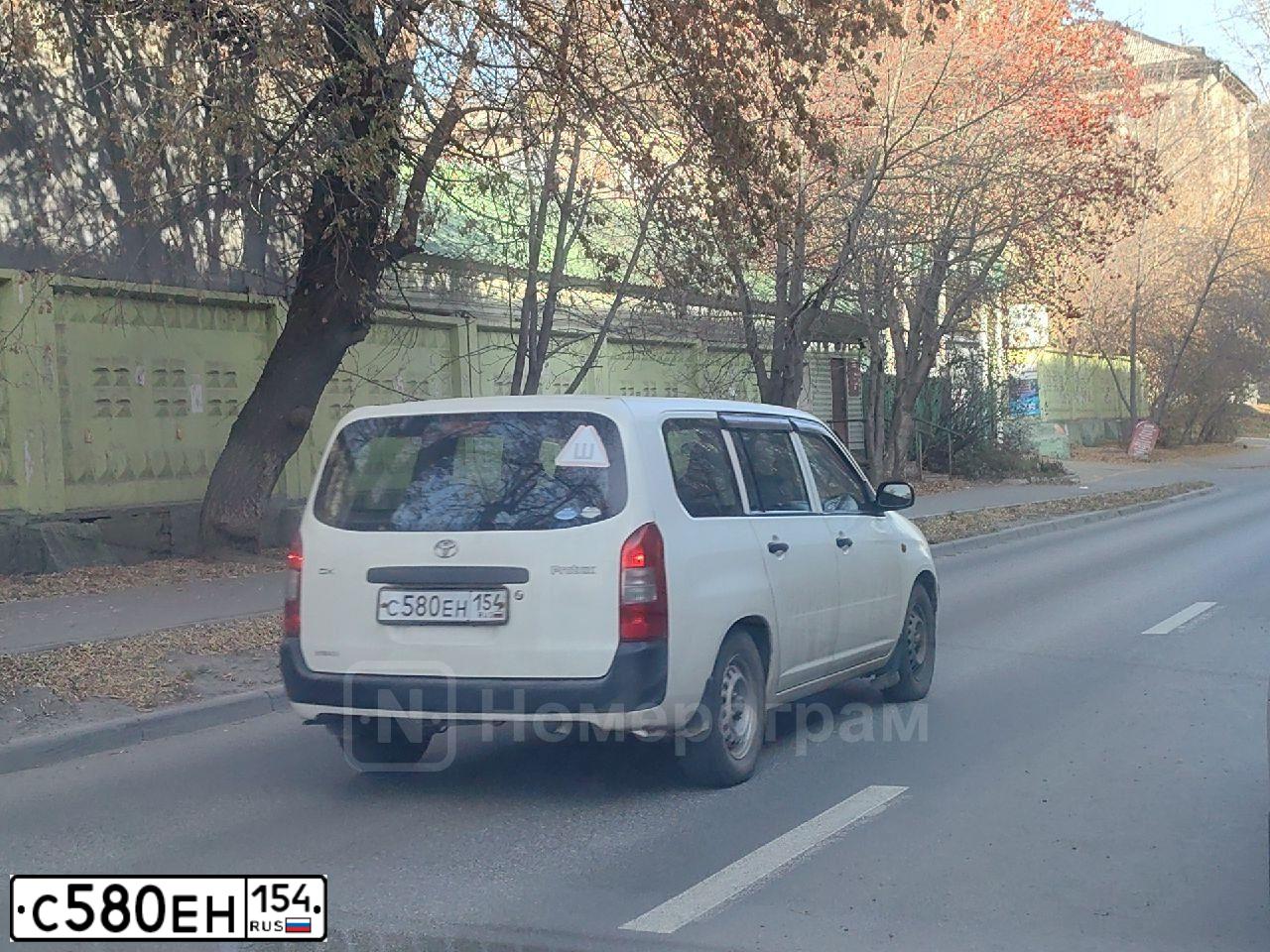Фото автомобиля VOLVO SERIE FM /6X6/, 2019 — госномер О580ЕН154. Цвет: Красный