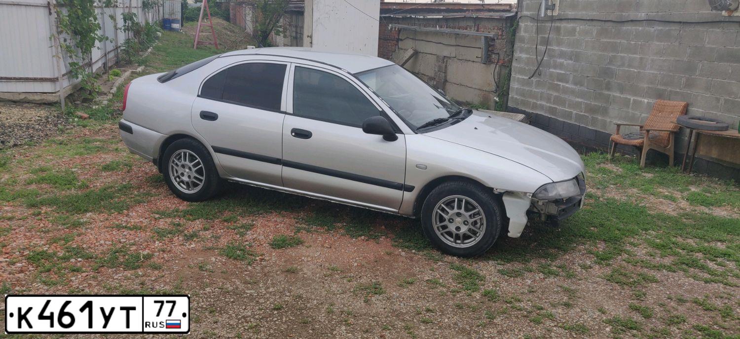 Фото автомобиля MITSUBISHI CARISMA, 2001 — госномер О331МА193. Цвет: Серебристый