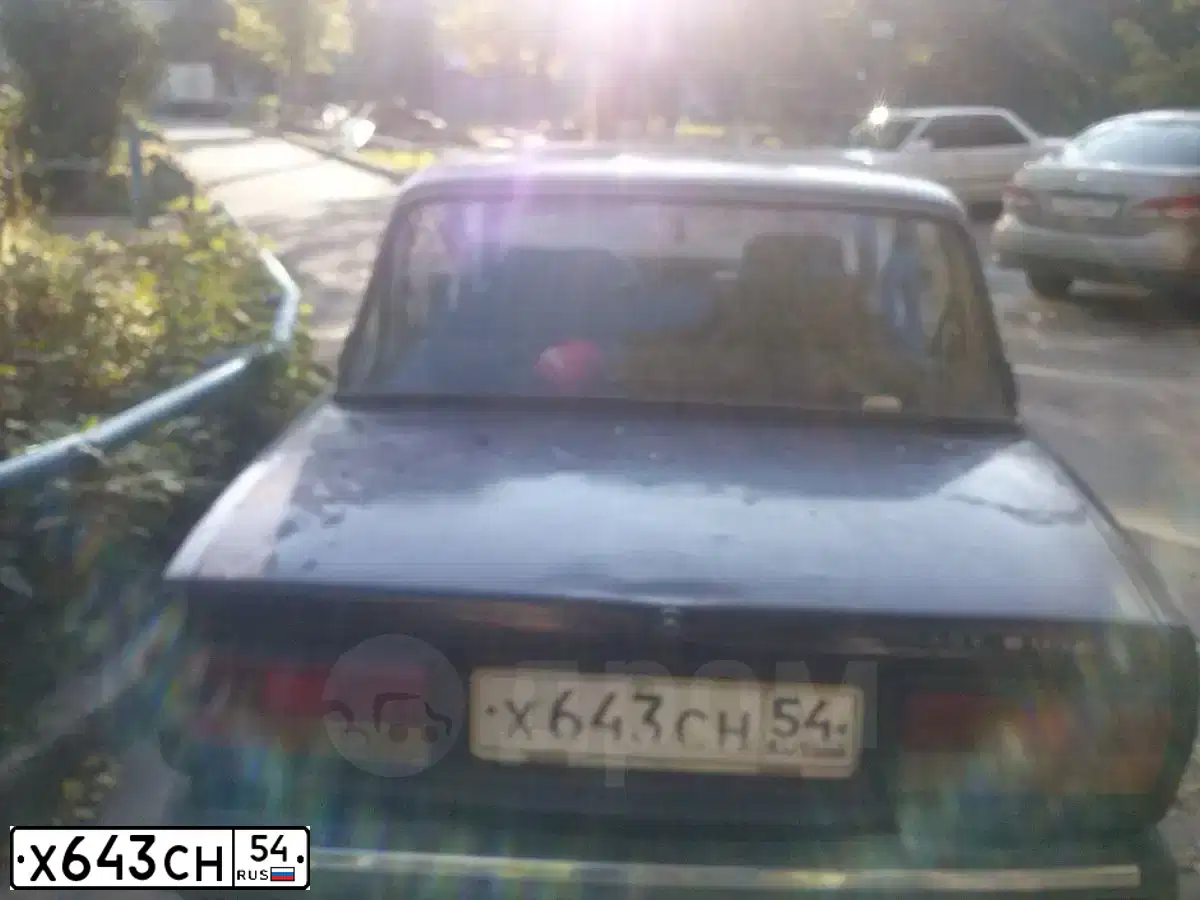 Фото автомобиля LADA 2107, 2001 — госномер Х643СН54. Цвет: ФИОЛЕТОВЫЙ