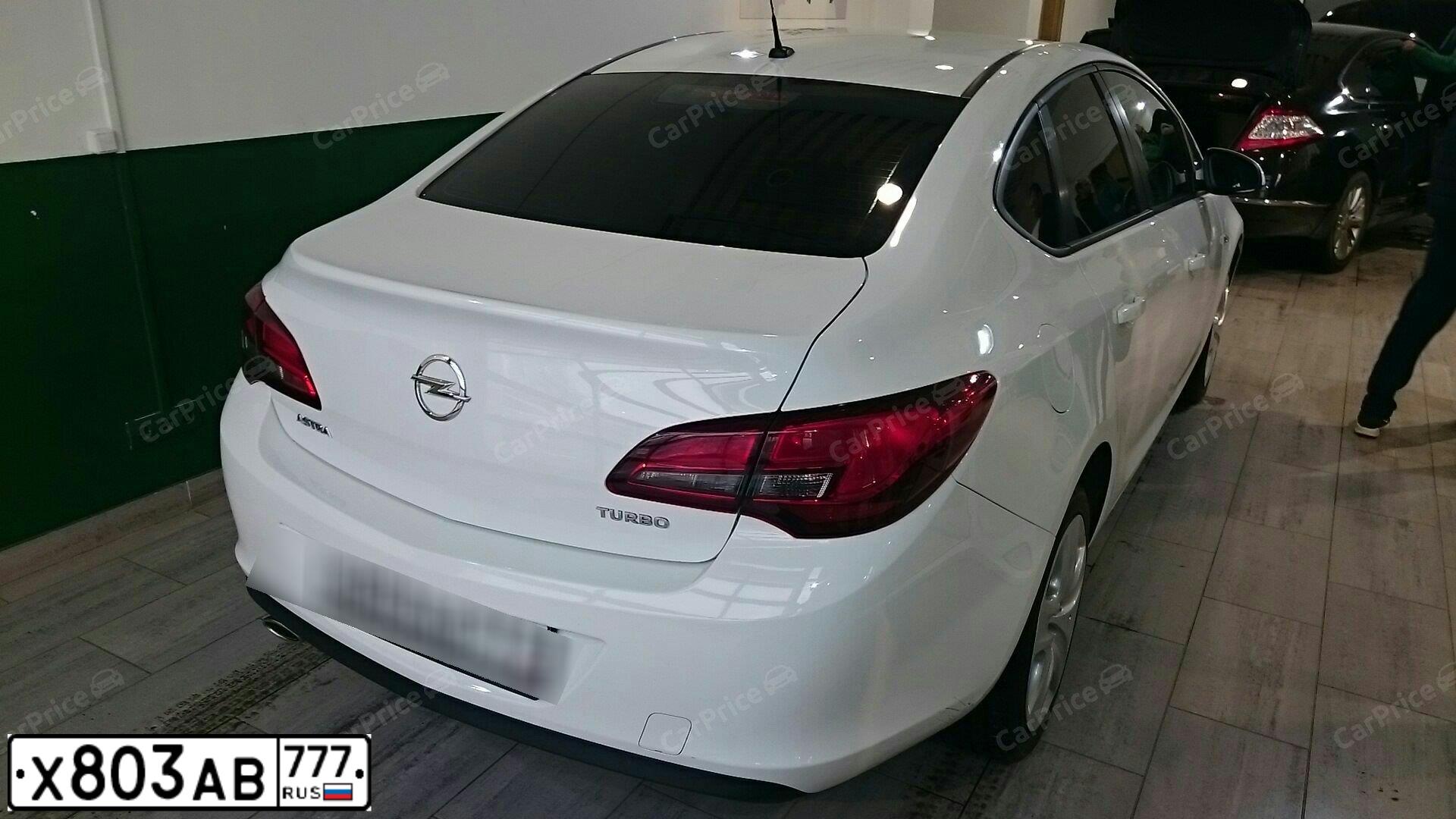 Фото автомобиля OPEL ASTRA, 2013 — госномер М658АТ53