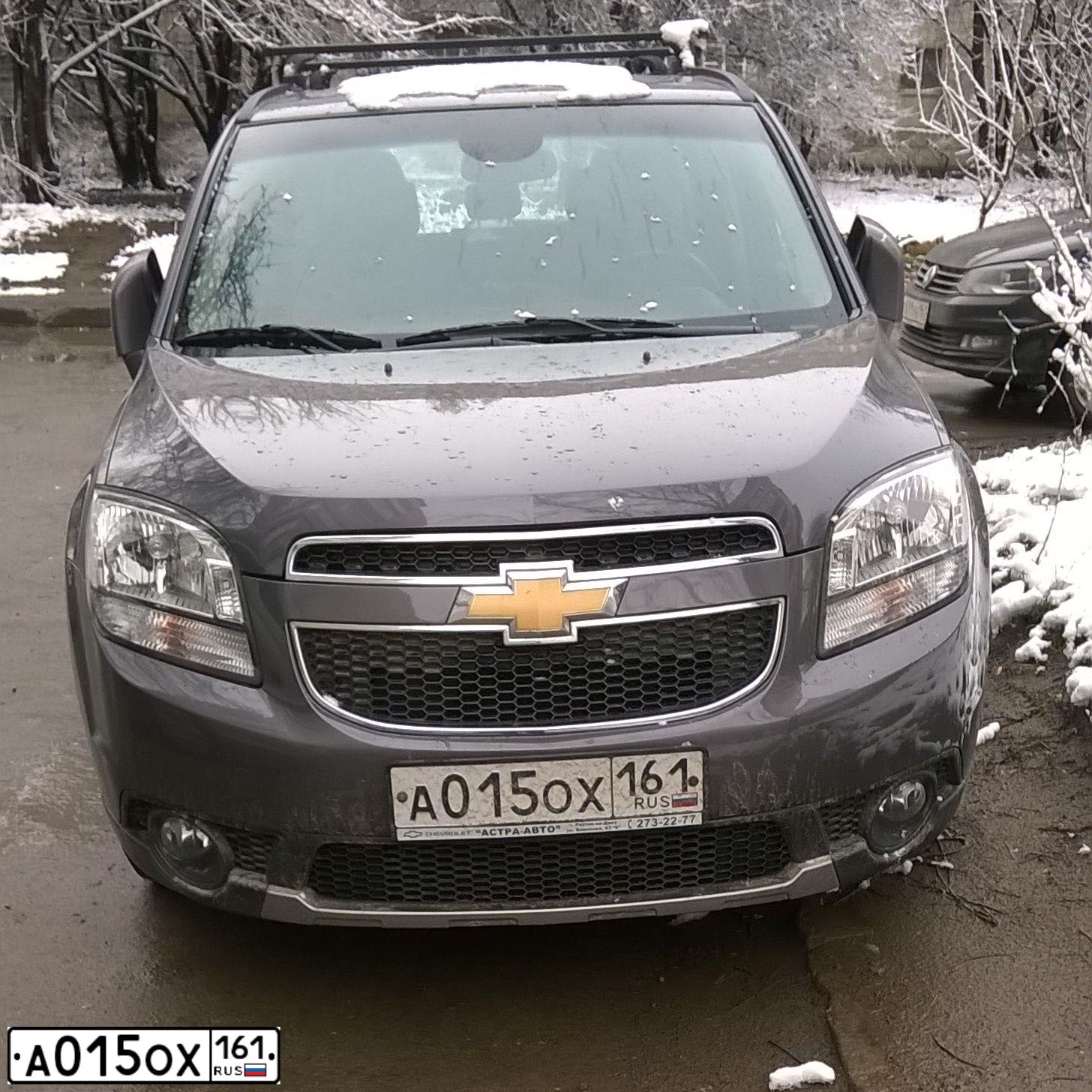 Фото автомобиля CHEVROLET ORLANDO, 2011 — госномер О248ТК69. Цвет: СЕРЫЙ