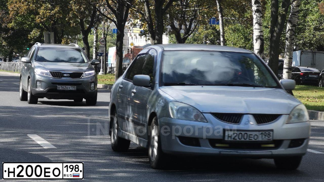 Фото автомобиля MITSUBISHI LANCER, 2004 — госномер М114ТС35. Цвет: СЕРЕБРИСТЫЙ