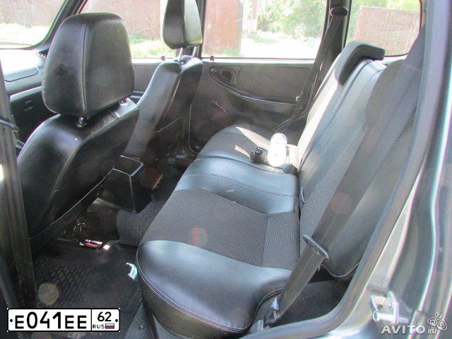 Фото автомобиля CHEVROLET NIVA, 2012 — госномер Е041ЕЕ62. Цвет: ТЕМНО-СЕРЫЙ МЕТАЛЛИК