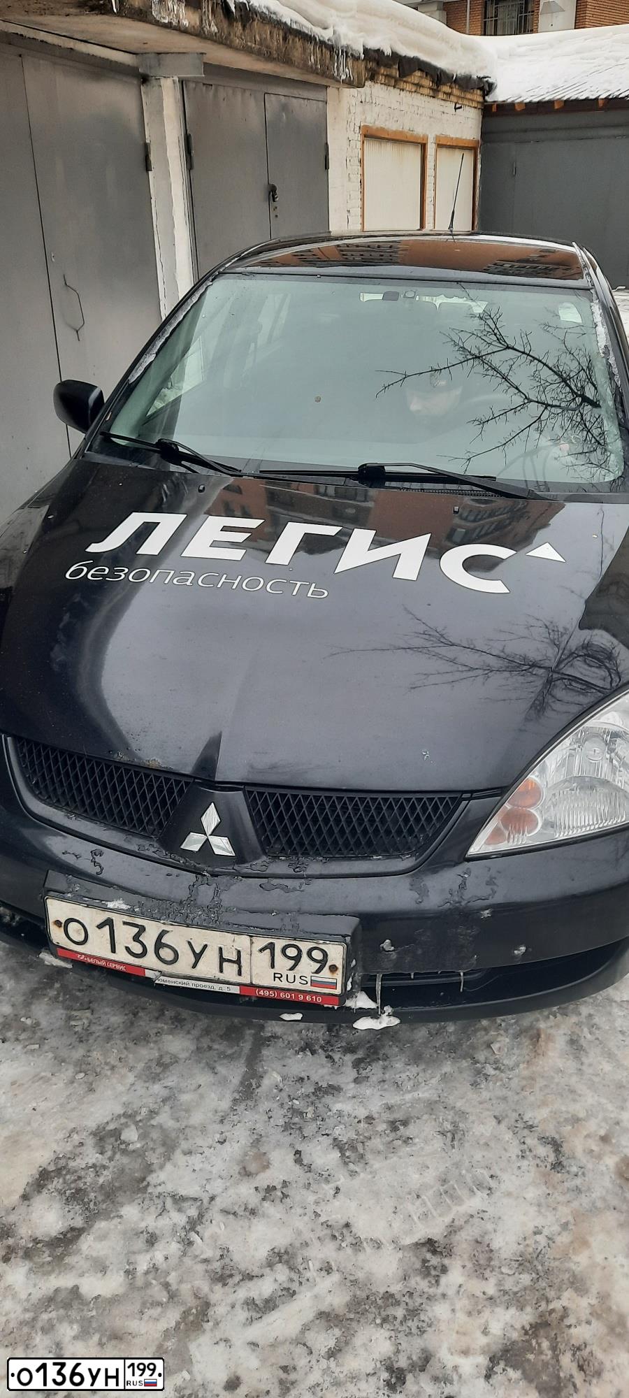 Фото автомобиля MITSUBISHI LANCER, 2009 — госномер О785АС134. Цвет: ЧЕРНЫЙ