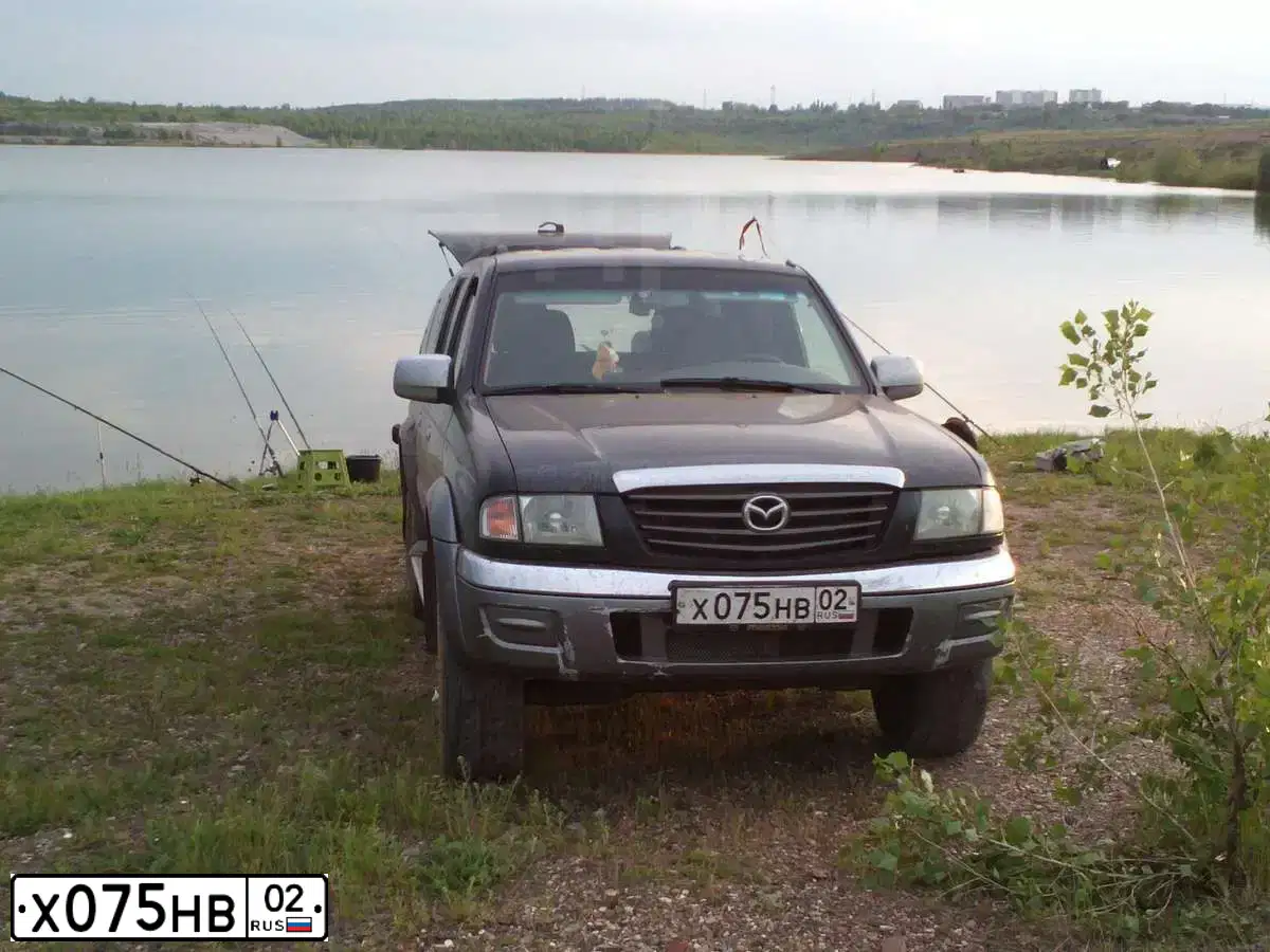 Фото автомобиля MAZDA B-SERIE, 2006 — госномер Х075НВ102. Цвет: ЧЕРНЫЙ
