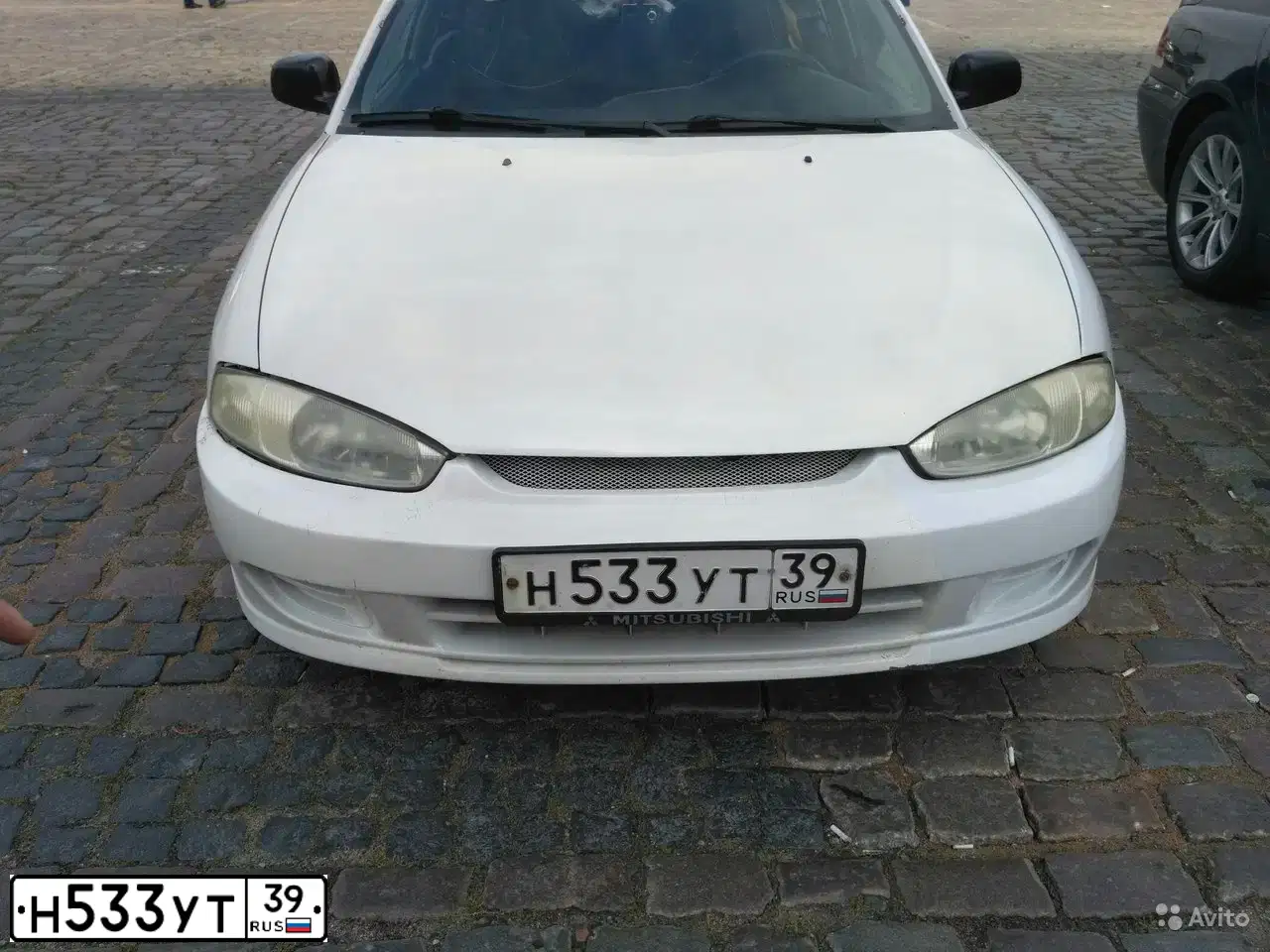 Фото автомобиля MITSUBISHI MIRAGE DINGO, 2002 — госномер В657АХ997. Цвет: Белый