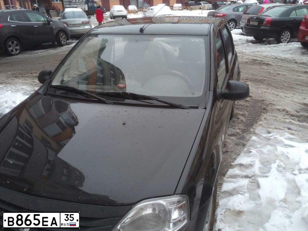 Фото автомобиля RENAULT LOGAN, 2010 — госномер Т284ЕР76. Цвет: ЧЕРНЫЙ