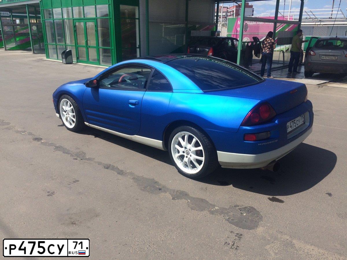 Фото автомобиля MITSUBISHI ECLIPSE, 2001 — госномер Е648ТУ82. Цвет: ХАМЕЛИОН