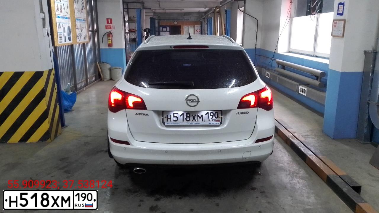 Фото автомобиля OPEL ASTRA, 2012 — госномер Р042НР68. Цвет: Белый