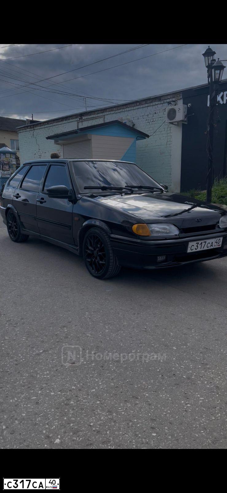 Фото автомобиля LADA 2114 SAMARA, 2012 — госномер С317СА40. Цвет: Сине-Черный