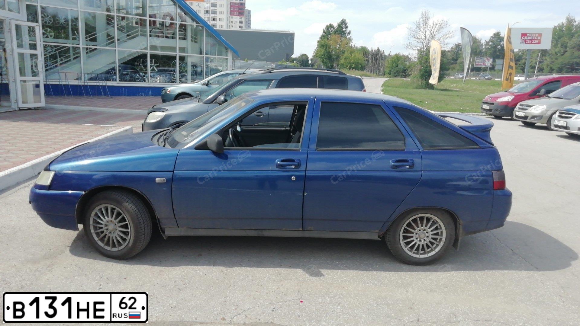 Фото автомобиля LADA 2112 LADA, 2003 — госномер В131НЕ62. Цвет: СЕРЕБРИСТЫЙ ЯРКО-СИНИЙ
