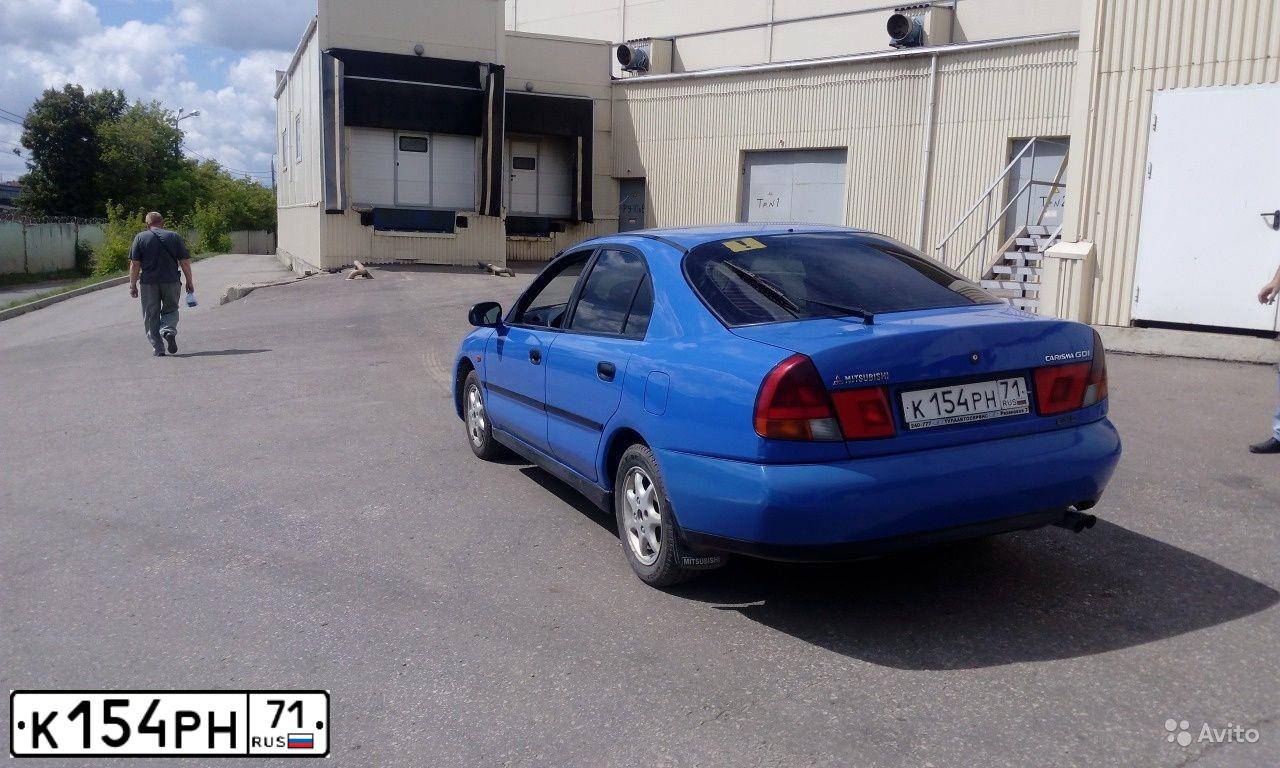Фото автомобиля MITSUBISHI CARISMA, 1999 — госномер У830МТ71. Цвет: синий