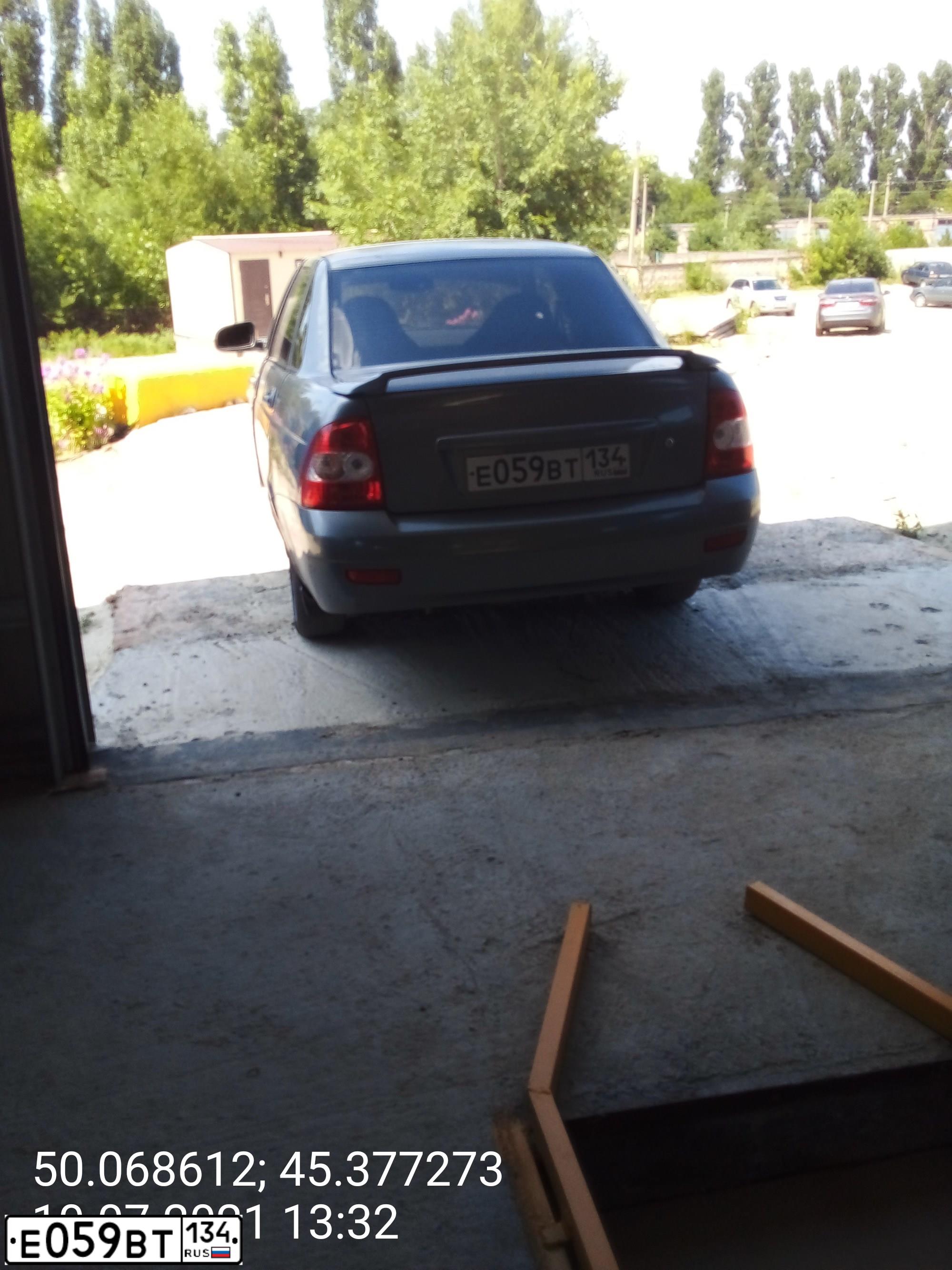 Фото автомобиля LADA 2170 PRIORA, 2010 — госномер Е059ВТ134. Цвет: СРЕДНИЙ СЕРО-ЗЕЛЕНЫЙ МЕТ