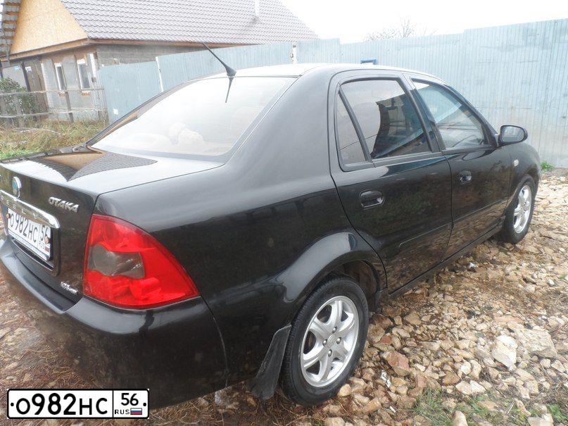 Фото автомобиля GEELY CK, 2007 — госномер Е941СН702. Цвет: ЧЕРНЫЙ