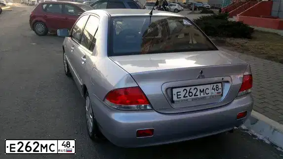 Фото автомобиля MITSUBISHI LANCER, 2007 — госномер Е262МС48. Цвет: СЕРЕБРИСТЫЙ