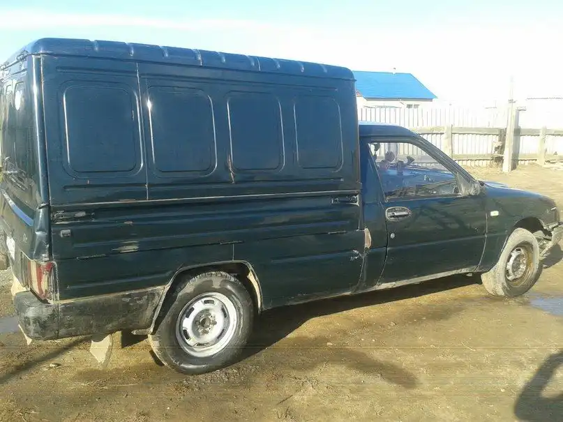 Фото автомобиля TAGAZ ACCENT, 2007 — госномер Е729НА702. Цвет: синий