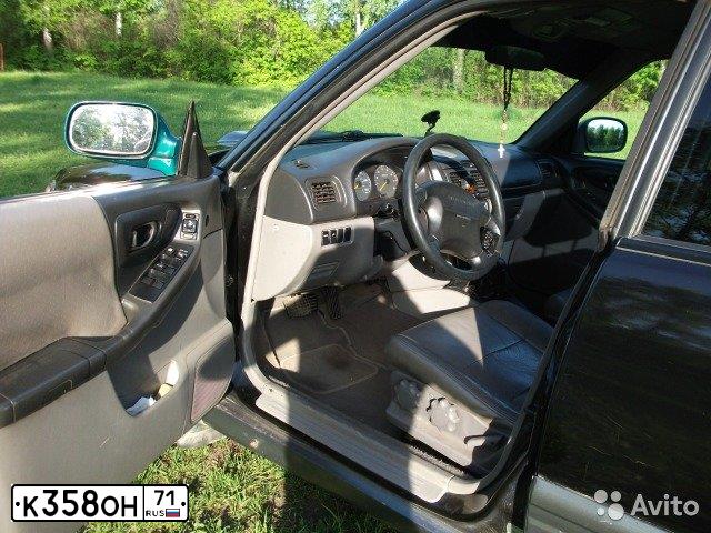 Фото автомобиля SUBARU FORESTER, 1998 — госномер К358ОН71. Цвет: ЧЕРНЫЙ