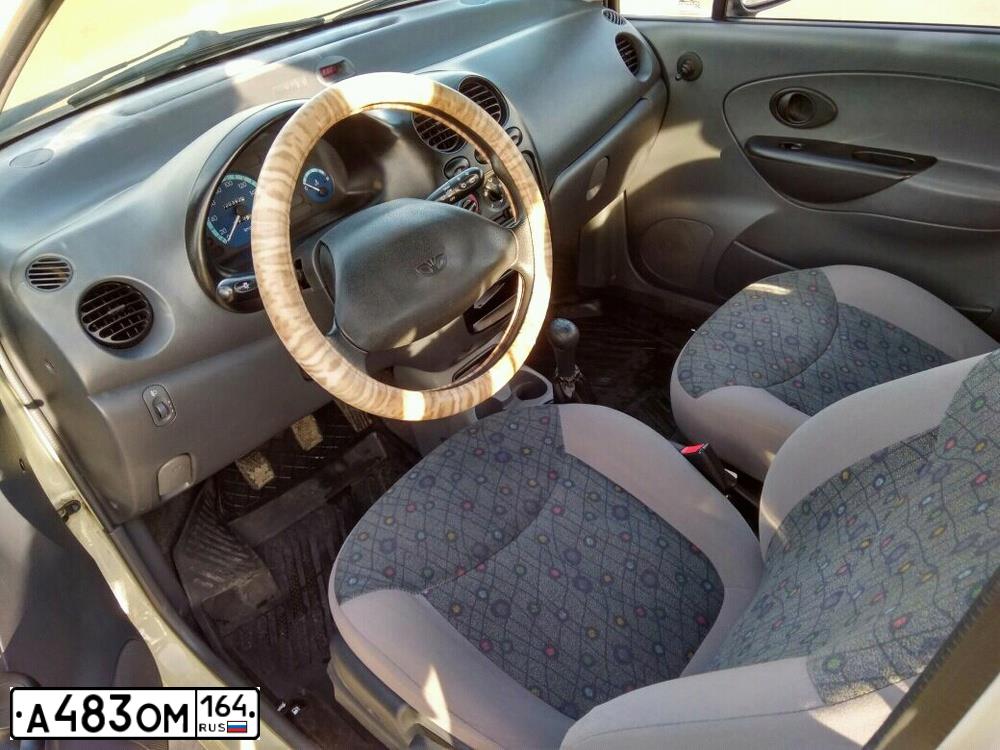Фото автомобиля DAEWOO MATIZ, 2012 — госномер Х757УЕ64. Цвет: ТОПЛЕНОЕ МОЛОКО