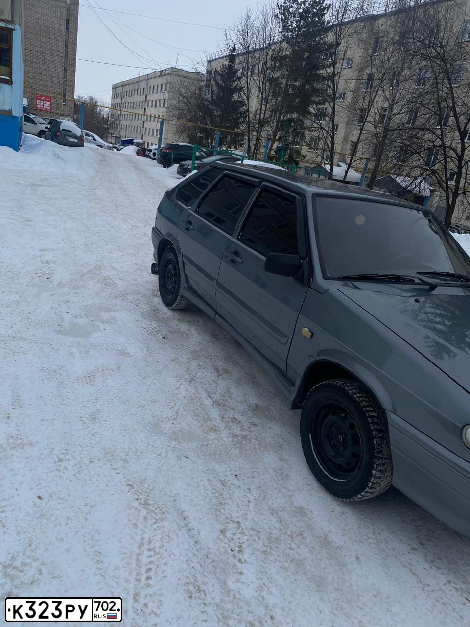 Фото автомобиля LADA 2114 SAMARA, 2011 — госномер К323РУ702. Цвет: СРЕДНИЙ СЕРО-ЗЕЛЕНЫЙ МЕТ.