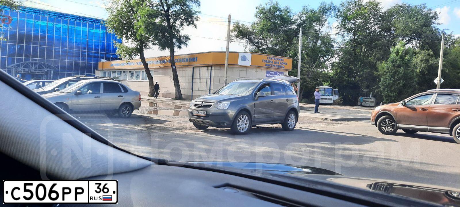 Фото автомобиля OPEL ANTARA, 2008 — госномер С506РР36. Цвет: СЕРЫЙ