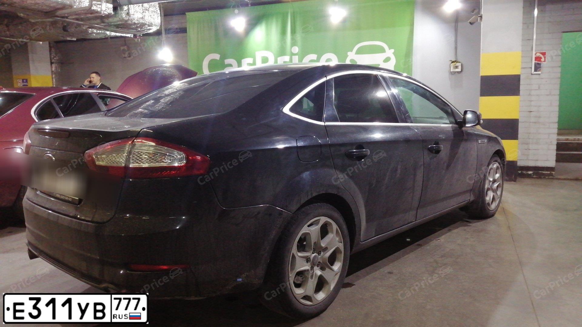 Фото автомобиля FORD MONDEO, 2011 — госномер Е311УВ777. Цвет: ЧЕРНЫЙ