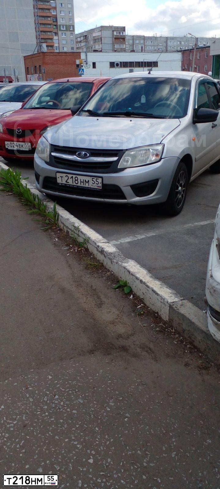 Фото автомобиля LADA 2191 GRANTA, 2015 — госномер Т218НМ55. Цвет: Серебристый