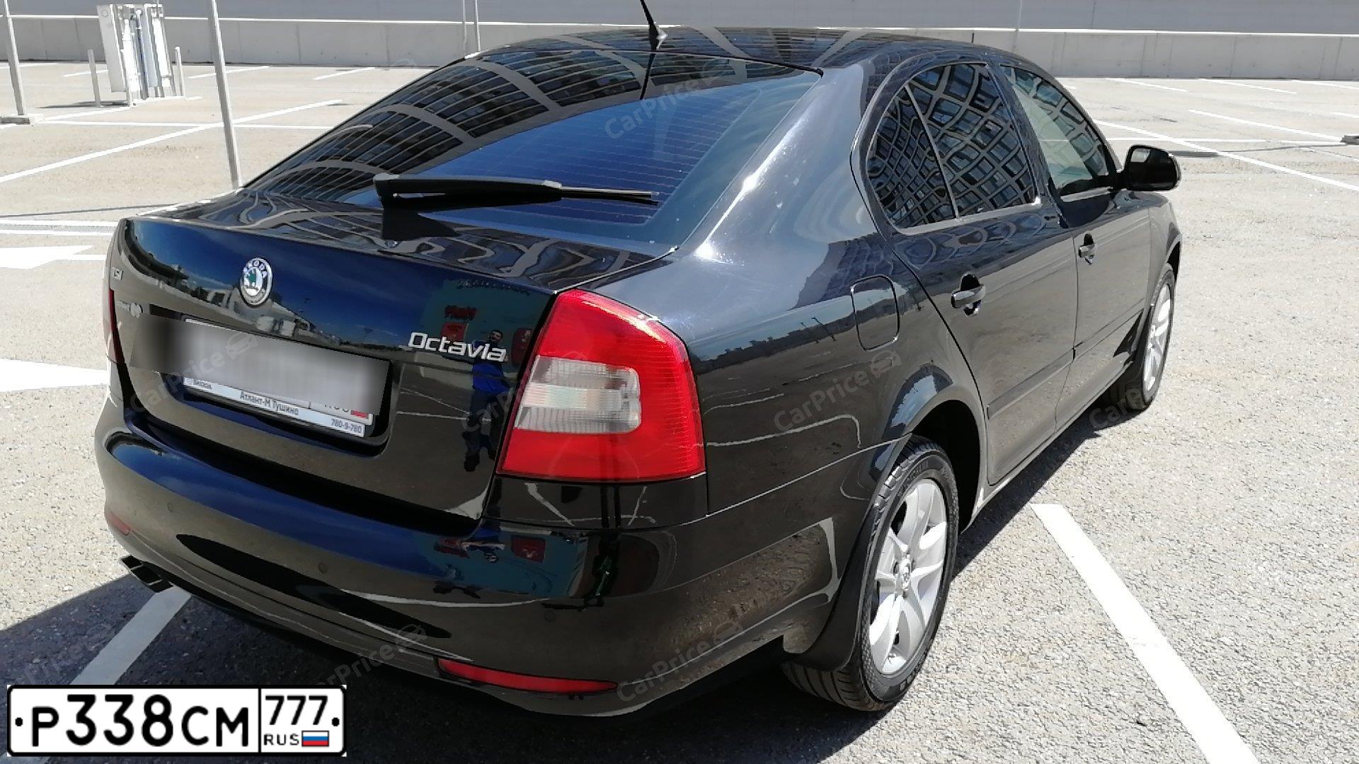 Фото автомобиля SKODA OCTAVIA, 2012 — госномер Р338СМ777. Цвет: ЧЕРНЫЙ