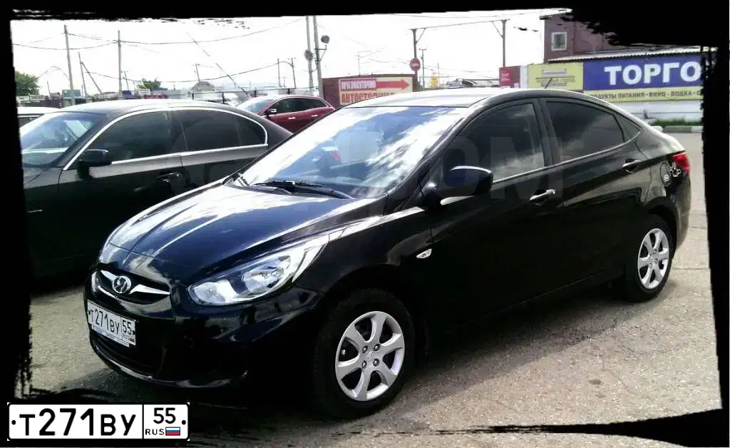 Фото автомобиля HYUNDAI SOLARIS, 2014 — госномер Т271ВУ55. Цвет: ЧЕРНЫЙ