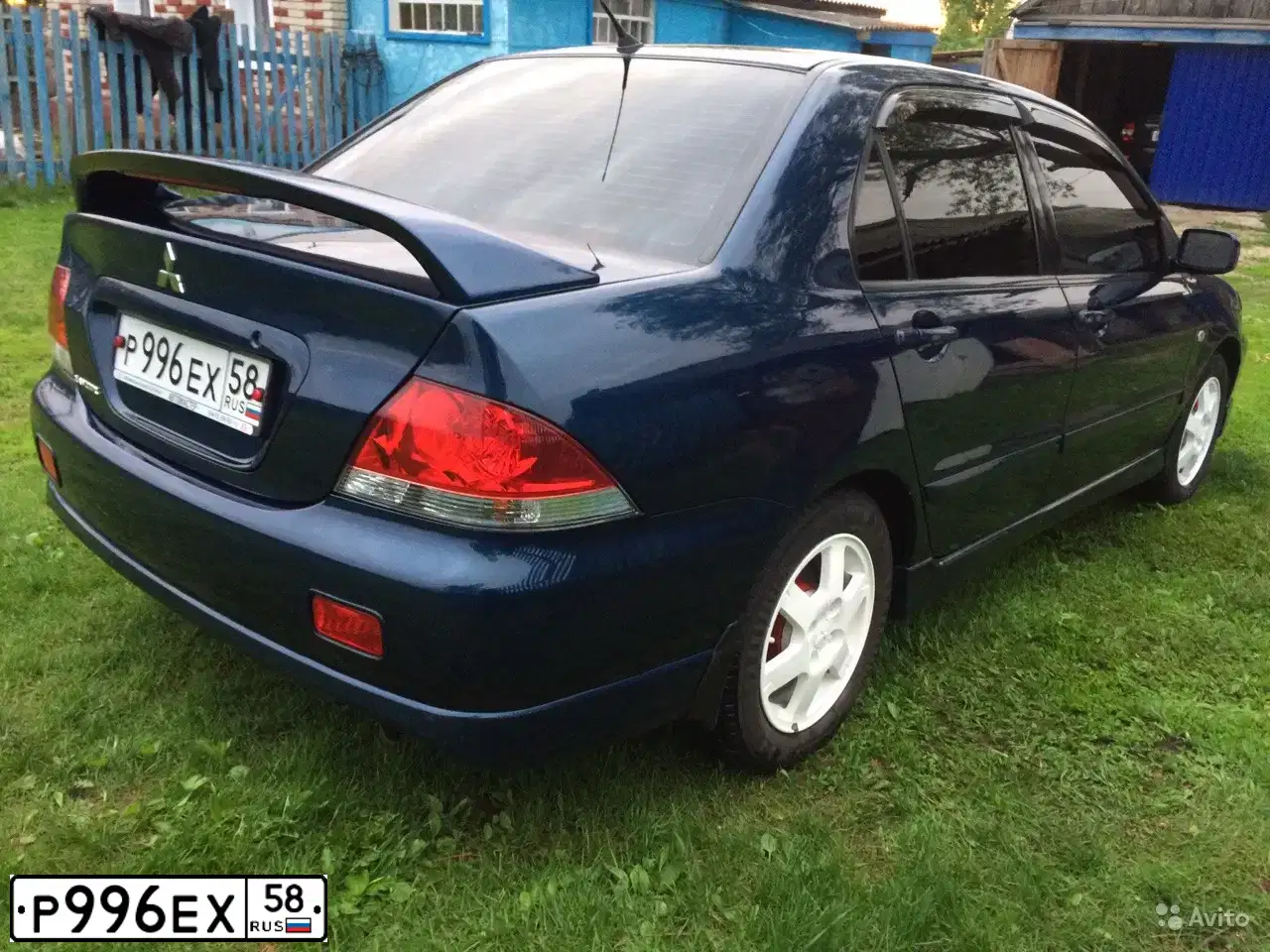 Фото автомобиля MITSUBISHI LANCER, 2006 — госномер М308СА13. Цвет: синий