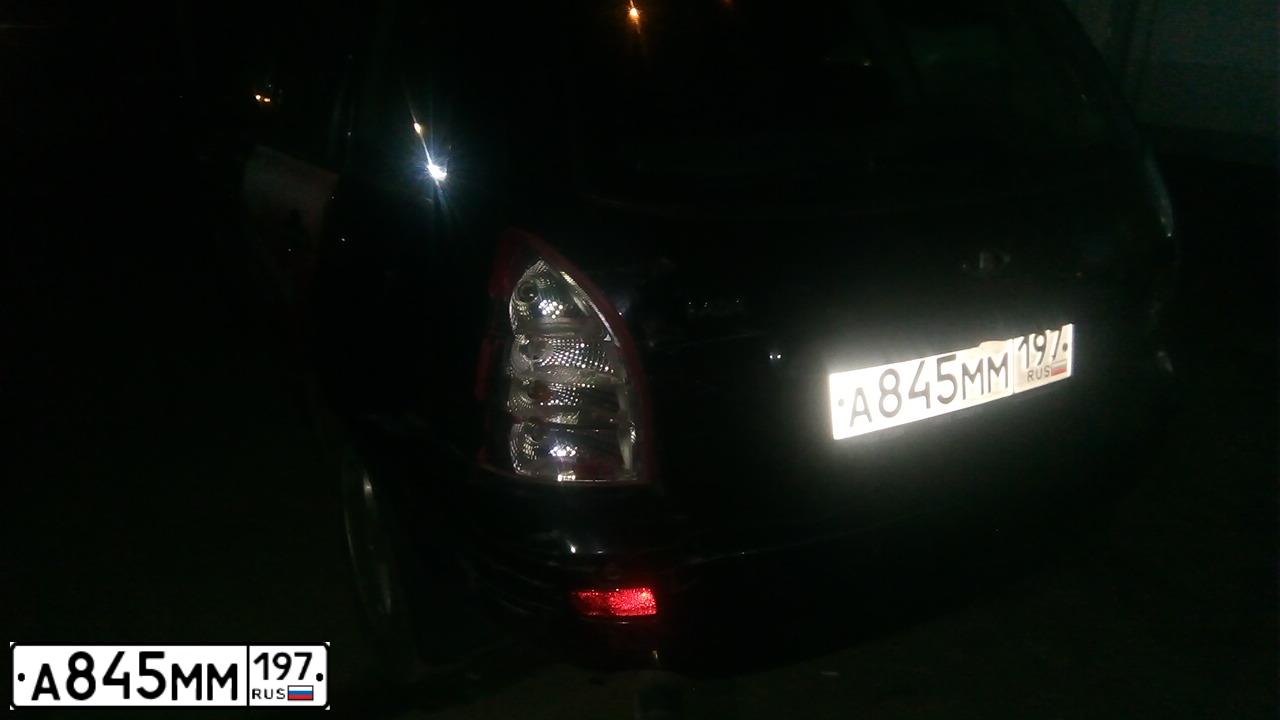 Фото автомобиля LADA 1117 KALINA, 2012 — госномер О699МС136. Цвет: СИНЕ-ЧЕРНЫЙ