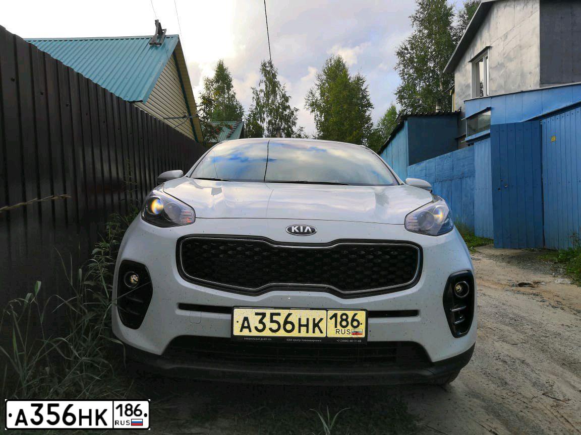 Фото автомобиля KIA SPORTAGE, 2018 — госномер У098УМ174. Цвет: Белый